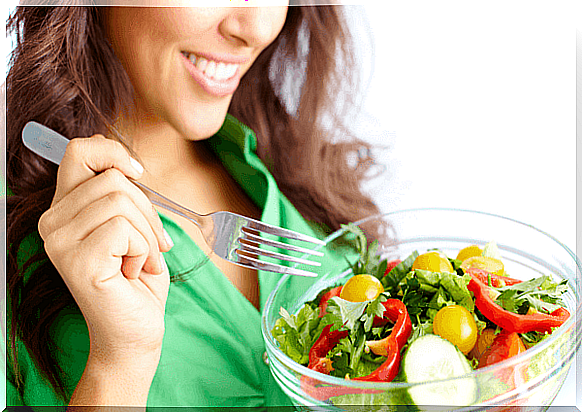 Woman eating a salad