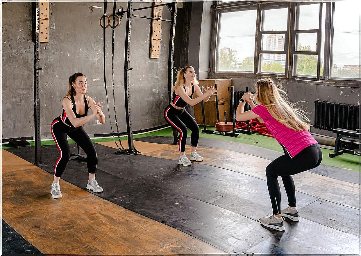 Women doing squats.