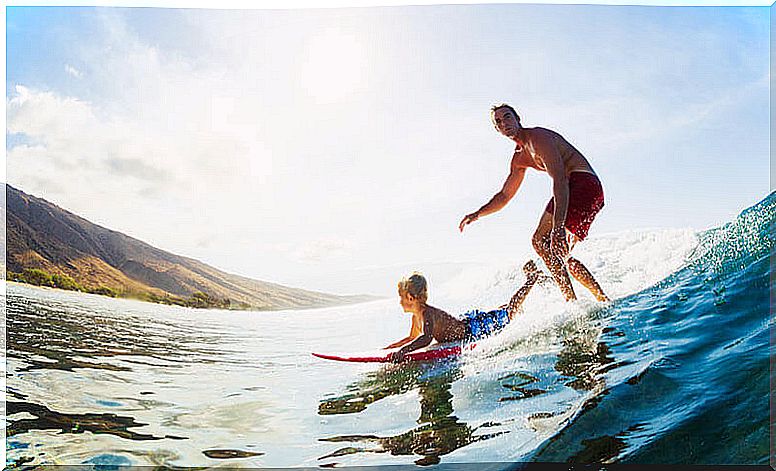 Father and son surfing