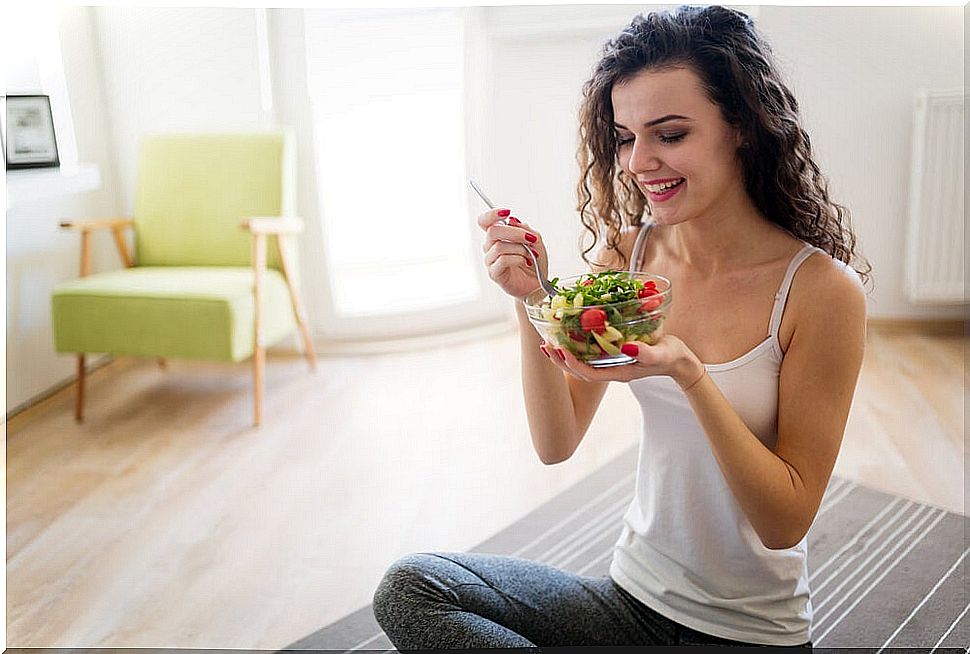 Woman eating a salad