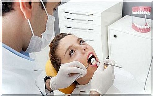 Dentist performing oral care for a child.